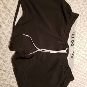 SOLD!!Black shirts with spandex attached . Dri fit